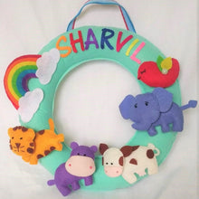 Load image into Gallery viewer, Personalized name bunting. Name bunting for nursery. Name bunting for bedroom. Felt name bunting. Children name bunting. Handmade gifts. Handmade bunting. Personalized décor. Nursery decoration. Nursery ideas. Moon wall décor. Pastel Wall décor. Jungle Safari Name Bunting. Safari Name Bunting. Animal Name Wreath
