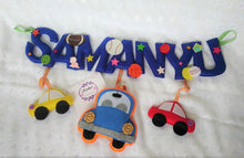 Load image into Gallery viewer, Personalized name bunting. Name bunting for nursery. Name bunting for bedroom. Felt name bunting. Children name bunting. Handmade gifts. Handmade bunting. Personalized décor. Nursery decoration. Nursery ideas. Moon wall décor. Moon wall hanging. Pastel Wall décor. Coat Mobile. Transport Theme Name Bunting. Car Name Bunting