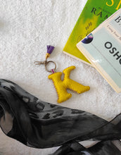 Load image into Gallery viewer, Key ring bag charm. Cute bag charm with stuffed alphabet. Hand bag charms. Felt bag charm. Unusual bag charm. Pink bag charm. Bag charm with lobster claw clip. Luxury bag charm. Tessel bag charm.