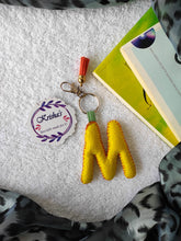 Load image into Gallery viewer, Key ring bag charm. Cute bag charm with stuffed alphabet. Hand bag charms. Felt bag charm. Unusual bag charm. Pink bag charm. Bag charm with lobster claw clip. Luxury bag charm. Tessel bag charm.