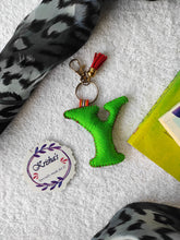 Load image into Gallery viewer, Key ring bag charm. Cute bag charm with stuffed alphabet. Hand bag charms. Felt bag charm. Unusual bag charm. Pink bag charm. Bag charm with lobster claw clip. Luxury bag charm. Tessel bag charm.
