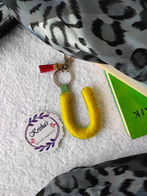 Load image into Gallery viewer, Key ring bag charm. Cute bag charm with stuffed alphabet. Hand bag charms. Felt bag charm. Unusual bag charm. Pink bag charm. Bag charm with lobster claw clip. Luxury bag charm. Tessel bag charm.