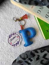 Load image into Gallery viewer, Key ring bag charm. Cute bag charm with stuffed alphabet. Hand bag charms. Felt bag charm. Unusual bag charm. Pink bag charm. Bag charm with lobster claw clip. Luxury bag charm. Tessel bag charm.