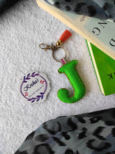 Load image into Gallery viewer, Key ring bag charm. Cute bag charm with stuffed alphabet. Hand bag charms. Felt bag charm. Unusual bag charm. Pink bag charm. Bag charm with lobster claw clip. Luxury bag charm. Tessel bag charm.