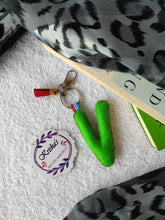 Load image into Gallery viewer, Key ring bag charm. Cute bag charm with stuffed alphabet. Hand bag charms. Felt bag charm. Unusual bag charm. Pink bag charm. Bag charm with lobster claw clip. Luxury bag charm. Tessel bag charm.