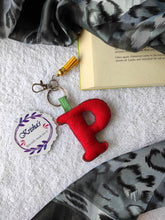 Load image into Gallery viewer, Key ring bag charm. Cute bag charm with stuffed alphabet. Hand bag charms. Felt bag charm. Unusual bag charm. Pink bag charm. Bag charm with lobster claw clip. Luxury bag charm. Tessel bag charm.