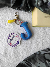 Load image into Gallery viewer, Key ring bag charm. Cute bag charm with stuffed alphabet. Hand bag charms. Felt bag charm. Unusual bag charm. Pink bag charm. Bag charm with lobster claw clip. Luxury bag charm. Tessel bag charm.