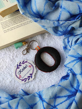 Load image into Gallery viewer, Key ring bag charm. Cute bag charm with stuffed alphabet. Hand bag charms. Felt bag charm. Unusual bag charm. Pink bag charm. Bag charm with lobster claw clip. Luxury bag charm. Tessel bag charm.