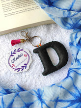 Load image into Gallery viewer, Key ring bag charm. Cute bag charm with stuffed alphabet. Hand bag charms. Felt bag charm. Unusual bag charm. Pink bag charm. Bag charm with lobster claw clip. Luxury bag charm. Tessel bag charm.