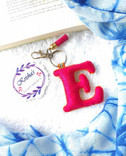 Load image into Gallery viewer, Key ring bag charm. Cute bag charm with stuffed alphabet. Hand bag charms. Felt bag charm. Unusual bag charm. Pink bag charm. Bag charm with lobster claw clip. Luxury bag charm. Tessel bag charm.
