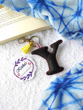 Load image into Gallery viewer, Key ring bag charm. Cute bag charm with stuffed alphabet. Hand bag charms. Felt bag charm. Unusual bag charm. Pink bag charm. Bag charm with lobster claw clip. Luxury bag charm. Tessel bag charm.