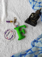 Load image into Gallery viewer, Key ring bag charm. Cute bag charm with stuffed alphabet. Hand bag charms. Felt bag charm. Unusual bag charm. Pink bag charm. Bag charm with lobster claw clip. Luxury bag charm. Tessel bag charm.