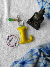 Load image into Gallery viewer, Key ring bag charm. Cute bag charm with stuffed alphabet. Hand bag charms. Felt bag charm. Unusual bag charm. Pink bag charm. Bag charm with lobster claw clip. Luxury bag charm. Tessel bag charm.