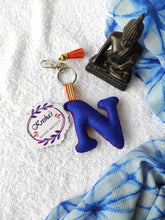 Load image into Gallery viewer, Key ring bag charm. Cute bag charm with stuffed alphabet. Hand bag charms. Felt bag charm. Unusual bag charm. Pink bag charm. Bag charm with lobster claw clip. Luxury bag charm. Tessel bag charm.