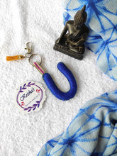 Load image into Gallery viewer, Key ring bag charm. Cute bag charm with stuffed alphabet. Hand bag charms. Felt bag charm. Unusual bag charm. Pink bag charm. Bag charm with lobster claw clip. Luxury bag charm. Tessel bag charm.