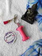 Load image into Gallery viewer, Key ring bag charm. Cute bag charm with stuffed alphabet. Hand bag charms. Felt bag charm. Unusual bag charm. Pink bag charm. Bag charm with lobster claw clip. Luxury bag charm. Tessel bag charm.