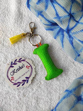 Load image into Gallery viewer, Key ring bag charm. Cute bag charm with stuffed alphabet. Hand bag charms. Felt bag charm. Unusual bag charm. Pink bag charm. Bag charm with lobster claw clip. Luxury bag charm. Tessel bag charm.