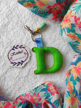 Load image into Gallery viewer, Key ring bag charm. Cute bag charm with stuffed alphabet. Hand bag charms. Felt bag charm. Unusual bag charm. Pink bag charm. Bag charm with lobster claw clip. Luxury bag charm. Tessel bag charm.