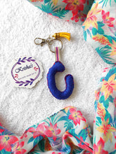 Load image into Gallery viewer, Key ring bag charm. Cute bag charm with stuffed alphabet. Hand bag charms. Felt bag charm. Unusual bag charm. Pink bag charm. Bag charm with lobster claw clip. Luxury bag charm. Tessel bag charm.
