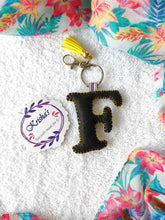 Load image into Gallery viewer, Key ring bag charm. Cute bag charm with stuffed alphabet. Hand bag charms. Felt bag charm. Unusual bag charm. Pink bag charm. Bag charm with lobster claw clip. Luxury bag charm. Tessel bag charm.