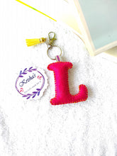 Load image into Gallery viewer, Key ring bag charm. Cute bag charm with stuffed alphabet. Hand bag charms. Felt bag charm. Unusual bag charm. Pink bag charm. Bag charm with lobster claw clip. Luxury bag charm. Tessel bag charm.