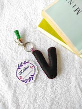 Load image into Gallery viewer, Key ring bag charm. Cute bag charm with stuffed alphabet. Hand bag charms. Felt bag charm. Unusual bag charm. Pink bag charm. Bag charm with lobster claw clip. Luxury bag charm. Tessel bag charm.