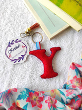 Load image into Gallery viewer, Key ring bag charm. Cute bag charm with stuffed alphabet. Hand bag charms. Felt bag charm. Unusual bag charm. Pink bag charm. Bag charm with lobster claw clip. Luxury bag charm. Tessel bag charm.