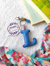 Load image into Gallery viewer, Key ring bag charm. Cute bag charm with stuffed alphabet. Hand bag charms. Felt bag charm. Unusual bag charm. Pink bag charm. Bag charm with lobster claw clip. Luxury bag charm. Tessel bag charm.