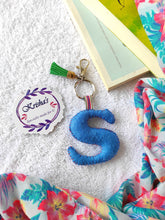 Load image into Gallery viewer, Key ring bag charm. Cute bag charm with stuffed alphabet. Hand bag charms. Felt bag charm. Unusual bag charm. Pink bag charm. Bag charm with lobster claw clip. Luxury bag charm. Tessel bag charm.