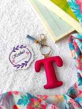 Load image into Gallery viewer, Key ring bag charm. Cute bag charm with stuffed alphabet. Hand bag charms. Felt bag charm. Unusual bag charm. Pink bag charm. Bag charm with lobster claw clip. Luxury bag charm. Tessel bag charm.