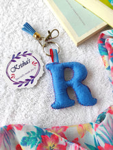 Load image into Gallery viewer, Key ring bag charm. Cute bag charm with stuffed alphabet. Hand bag charms. Felt bag charm. Unusual bag charm. Pink bag charm. Bag charm with lobster claw clip. Luxury bag charm. Tessel bag charm.