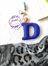 Load image into Gallery viewer, Key ring bag charm. Cute bag charm with stuffed alphabet. Hand bag charms. Felt bag charm. Unusual bag charm. Pink bag charm. Bag charm with lobster claw clip. Luxury bag charm. Tessel bag charm.