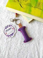 Load image into Gallery viewer, Key ring bag charm. Cute bag charm with stuffed alphabet. Hand bag charms. Felt bag charm. Unusual bag charm. Pink bag charm. Bag charm with lobster claw clip. Luxury bag charm. Tessel bag charm.