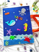 Load image into Gallery viewer, Craft bag. Craft tote. Kraft gift bags. Felt handbag. Felt tote bag. Felt pouch. Felt gift bag. Craft folder. Felt craft folder. Personalized gift. Kids gift. Kids personalized gift. Unique gift. Handmade personalized gift. Handmade gift. Mickey mouse theme folder. Gift for girl. Return gift. underwater theme folder. blue folder. sea creature folder.