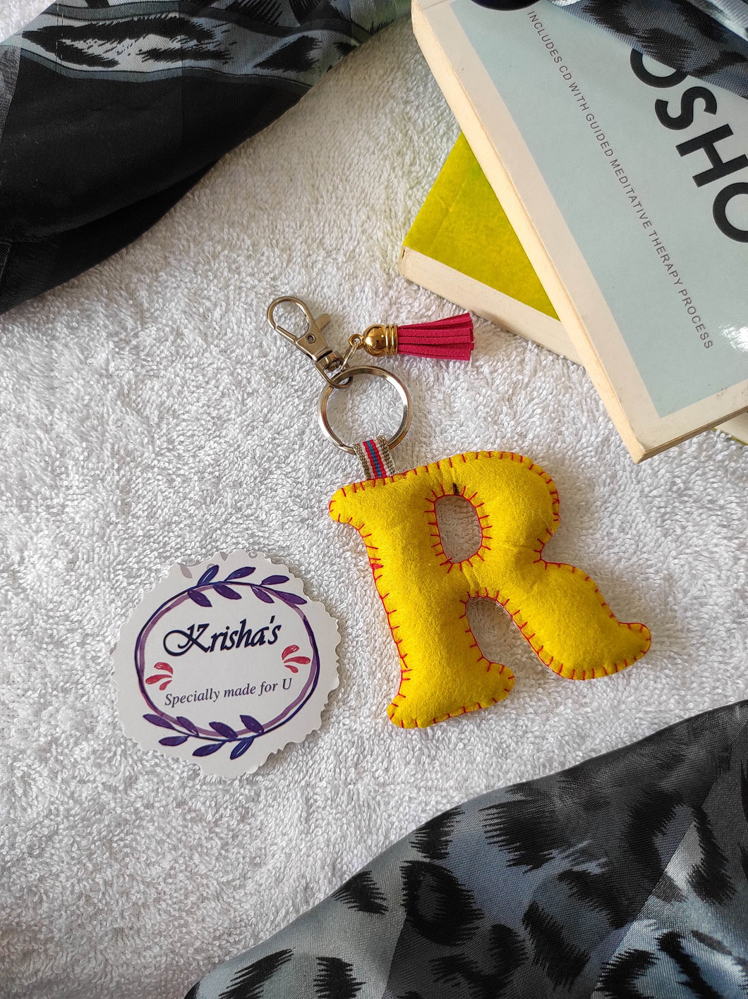 Key ring bag charm. Cute bag charm with stuffed alphabet. Hand bag charms. Felt bag charm. Unusual bag charm. Pink bag charm. Bag charm with lobster claw clip. Luxury bag charm. Tessel bag charm.