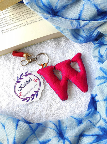 Key ring bag charm. Cute bag charm with stuffed alphabet. Hand bag charms. Felt bag charm. Unusual bag charm. Pink bag charm. Bag charm with lobster claw clip. Luxury bag charm. Tessel bag charm.