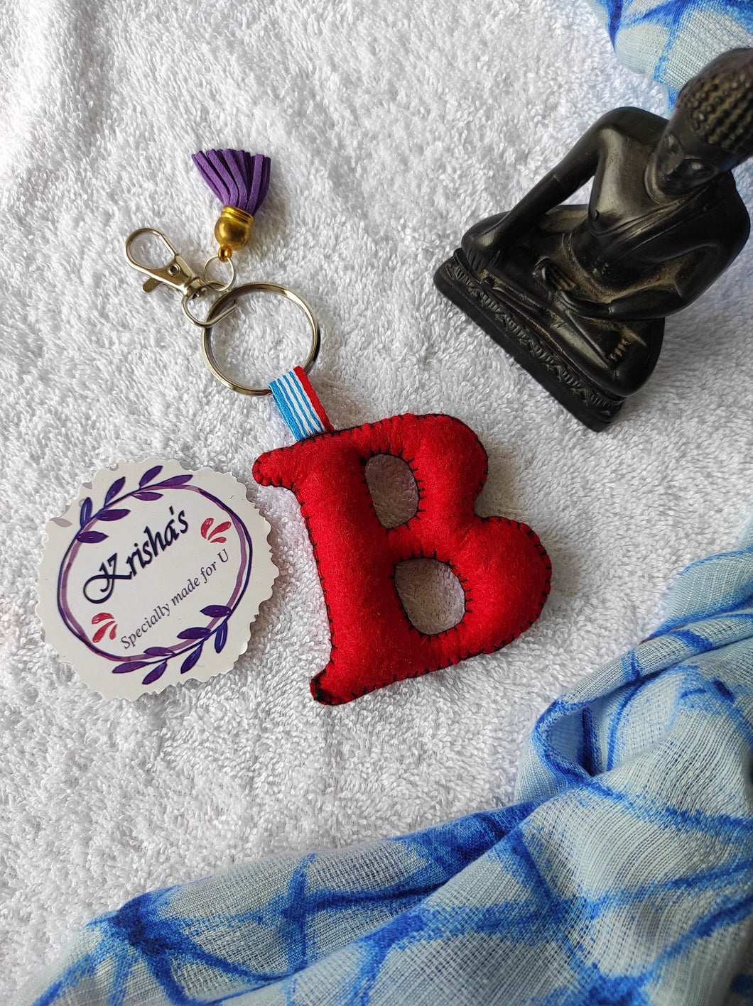Key ring bag charm. Cute bag charm with stuffed alphabet. Hand bag charms. Felt bag charm. Unusual bag charm. Pink bag charm. Bag charm with lobster claw clip. Luxury bag charm. Tessel bag charm.