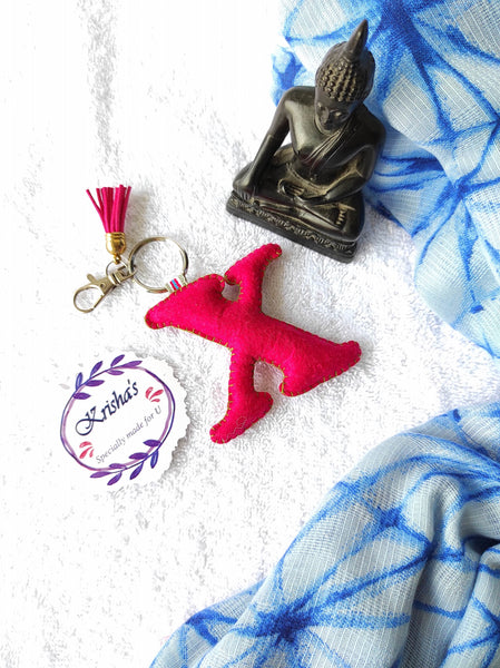 Key ring bag charm. Cute bag charm with stuffed alphabet. Hand bag charms. Felt bag charm. Unusual bag charm. Pink bag charm. Bag charm with lobster claw clip. Luxury bag charm. Tessel bag charm.