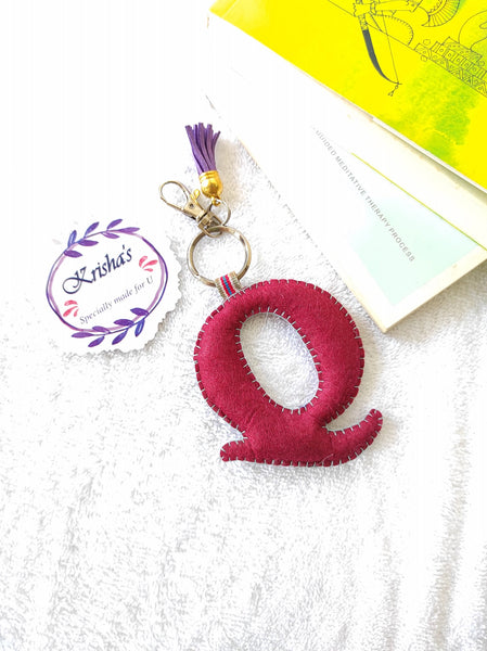 Key ring bag charm. Cute bag charm with stuffed alphabet. Hand bag charms. Felt bag charm. Unusual bag charm. Pink bag charm. Bag charm with lobster claw clip. Luxury bag charm. Tessel bag charm.