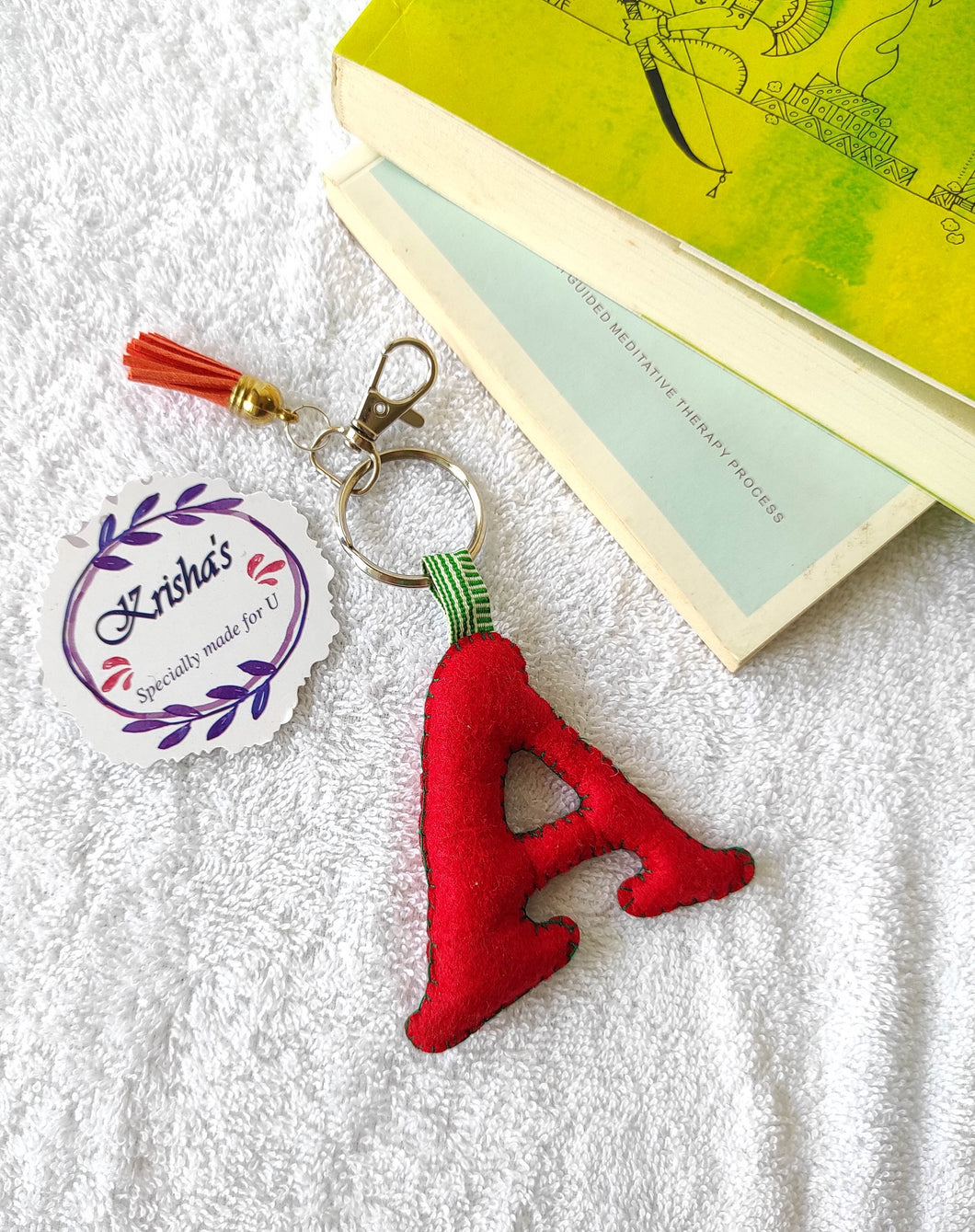 Key ring bag charm. Cute bag charm with stuffed alphabet. Hand bag charms. Felt bag charm. Unusual bag charm. Red bag charm. Bag charm with lobster claw clip. Luxury bag charm. Tessel bag charm.