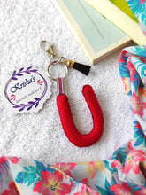 Load image into Gallery viewer, Key ring bag charm. Cute bag charm with stuffed alphabet. Hand bag charms. Felt bag charm. Unusual bag charm. Pink bag charm. Bag charm with lobster claw clip. Luxury bag charm. Tessel bag charm.
