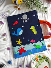 Load image into Gallery viewer, Craft bag. Craft tote. Kraft gift bags. Felt handbag. Felt tote bag. Felt pouch. Felt gift bag. Craft folder. Felt craft folder. Personalized gift. Kids gift. Kids personalized gift. Unique gift. Handmade personalized gift. Handmade gift. Mickey mouse theme folder. Gift for girl. Return gift. underwater theme folder. blue folder. sea creature folder.
